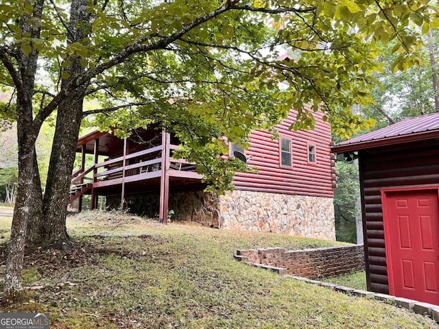 exterior space with a wooden deck