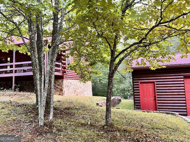 view of yard with a deck