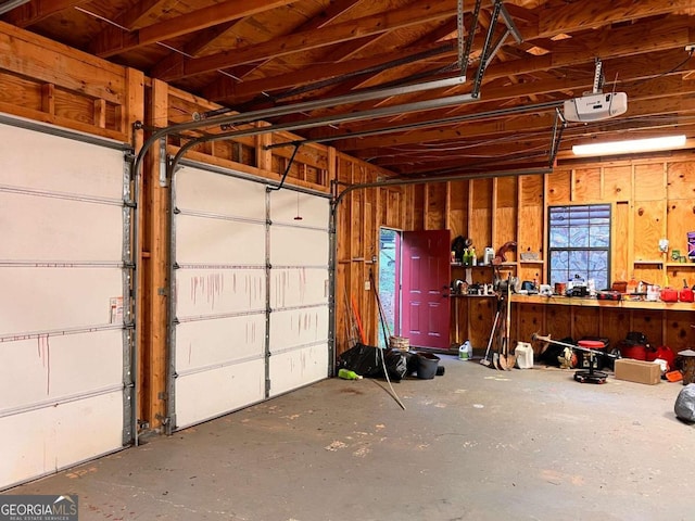 garage featuring a garage door opener