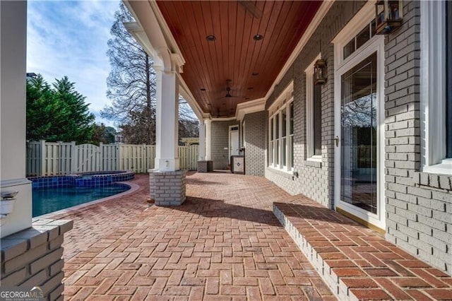 view of patio featuring a fenced in pool