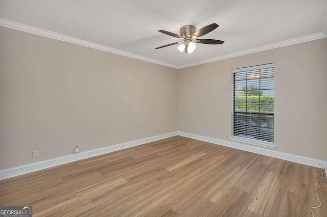 unfurnished room featuring light hardwood / wood-style floors, crown molding, a textured ceiling, and ceiling fan