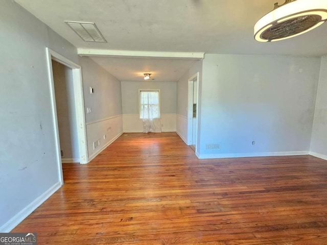 spare room featuring light hardwood / wood-style flooring