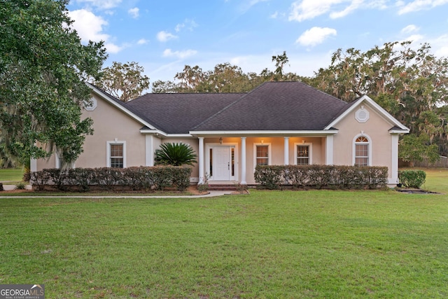 ranch-style house with a front yard