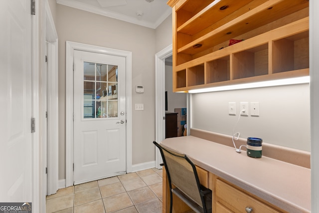 tiled office with built in desk and ornamental molding