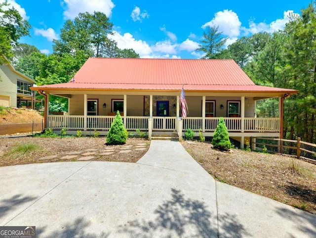 farmhouse inspired home featuring a porch