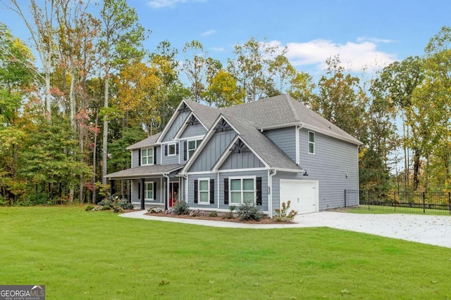 craftsman-style home featuring a front lawn and a garage