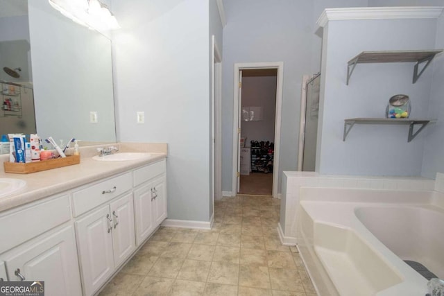 bathroom featuring vanity, ornamental molding, independent shower and bath, and tile patterned flooring