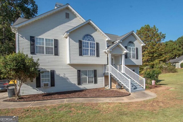 50 Carthedge Trce, Newnan, GA 30263 - raised ranch with a front yard