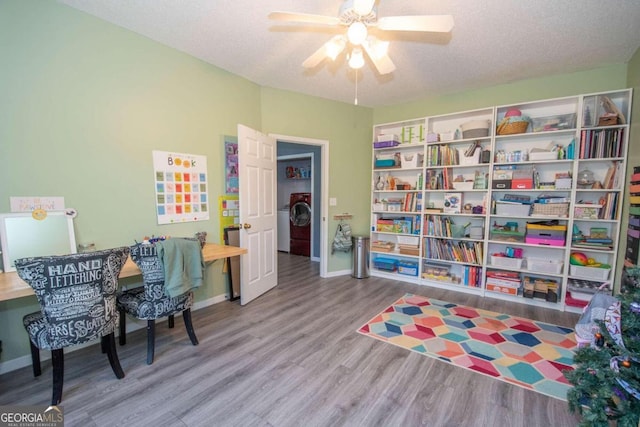 50 Carthedge Trce, Newnan, GA 30263 - office area with a ceiling fan, baseboards, washer / dryer, and wood finished floors