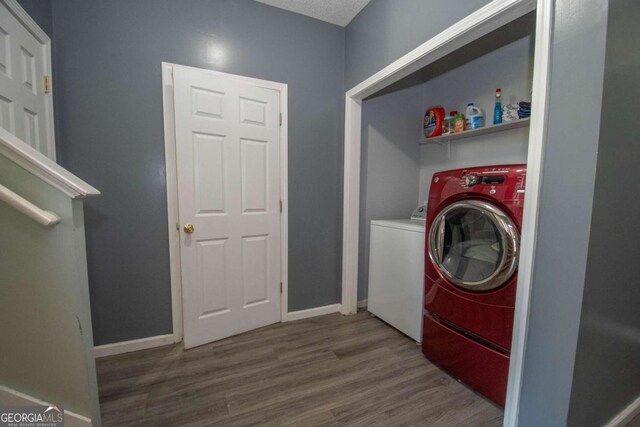 50 Carthedge Trce, Newnan, GA 30263 - clothes washing area with independent washer and dryer, wood finished floors, and baseboards
