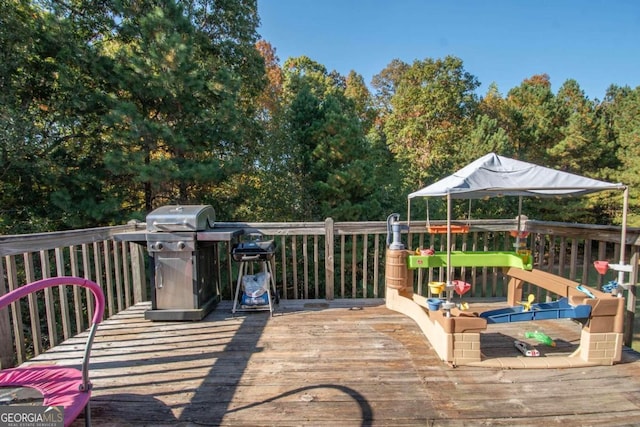 50 Carthedge Trce, Newnan, GA 30263 - wooden terrace with a grill