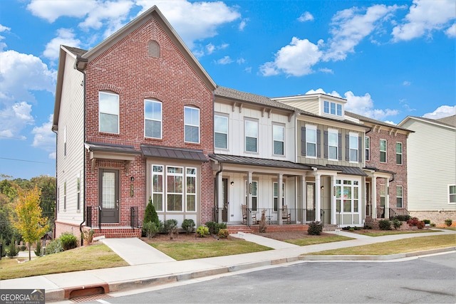 view of property with a front lawn