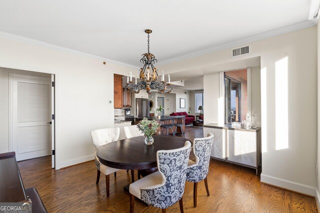 kitchen featuring dark wood-type flooring, dark brown cabinets, and a kitchen island