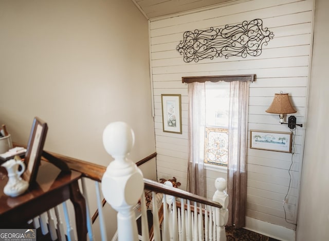 interior space featuring wooden walls