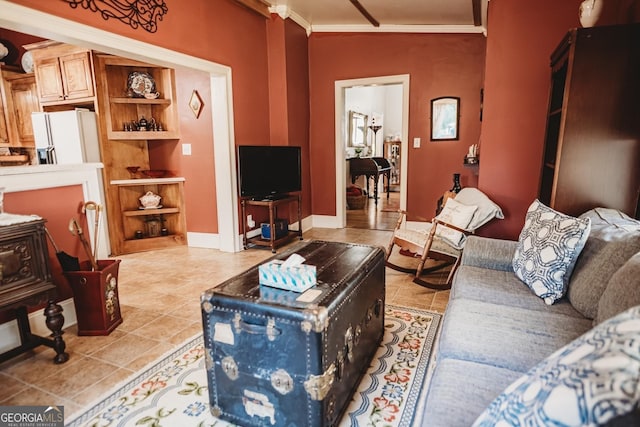 living room featuring crown molding and vaulted ceiling