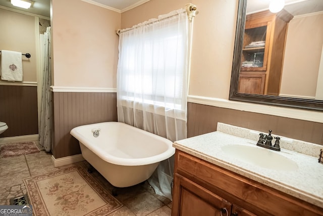 bathroom featuring vanity, crown molding, a tub to relax in, and wooden walls