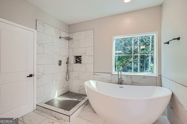 bathroom with independent shower and bath and tile walls