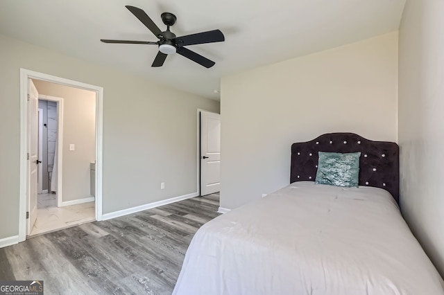 unfurnished bedroom featuring ceiling fan and wood-type flooring