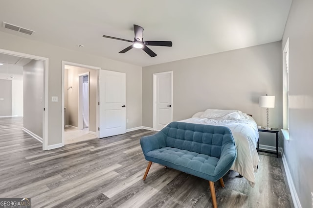 bedroom featuring hardwood / wood-style flooring and ceiling fan