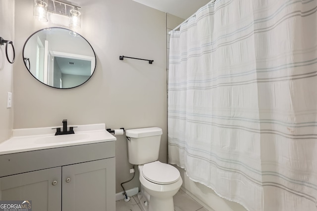 full bathroom featuring shower / bath combo, vanity, and toilet