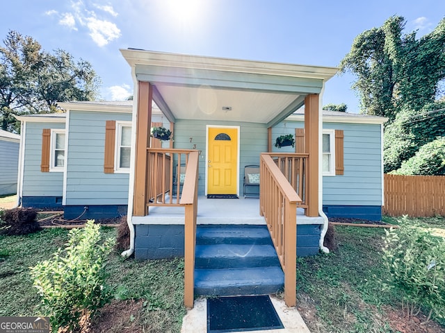 view of front of property featuring covered porch