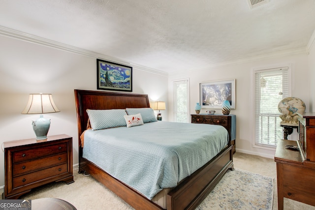 carpeted bedroom featuring multiple windows, ornamental molding, and a textured ceiling