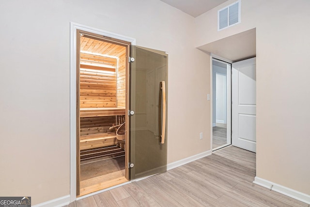 hall featuring light hardwood / wood-style floors