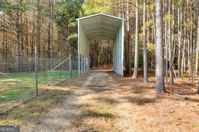 view of yard with a carport