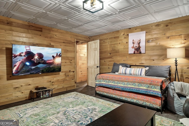 bedroom with dark hardwood / wood-style floors