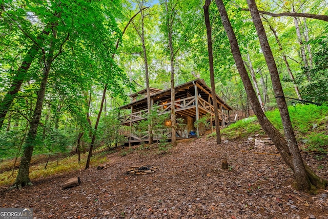 exterior space featuring a wooden deck