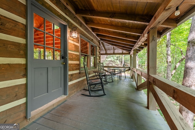 wooden deck featuring covered porch