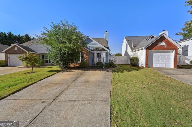 view of front of home featuring a front lawn and a garage