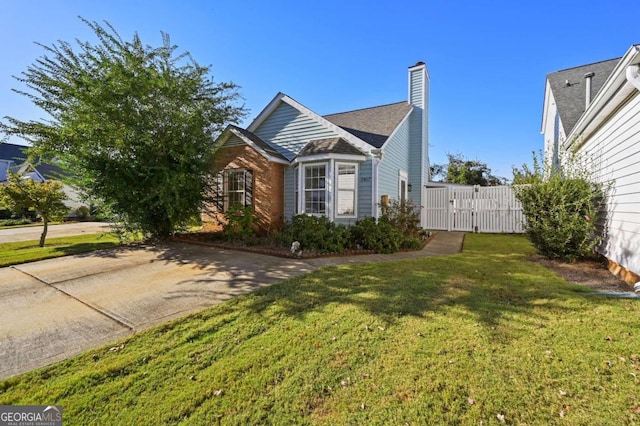 view of front of property with a front lawn