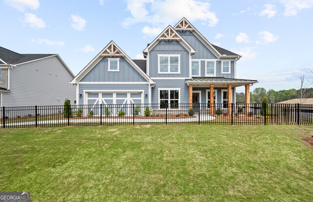 rear view of house with a lawn