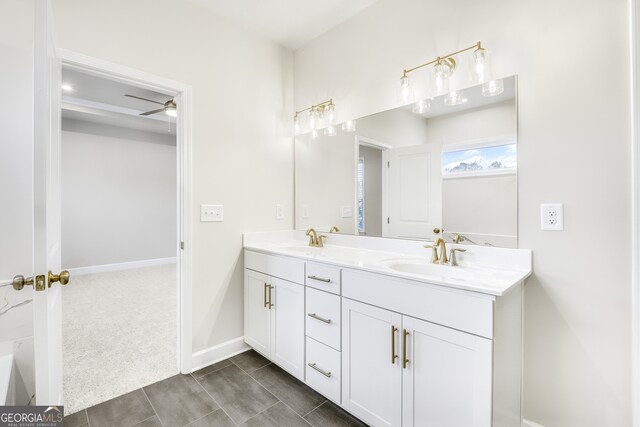 bathroom featuring vanity and ceiling fan