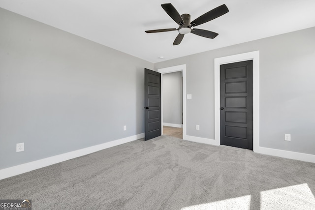 417 Lakeview Pl, Macon, GA 31211 - unfurnished bedroom featuring baseboards, carpet, and ceiling fan