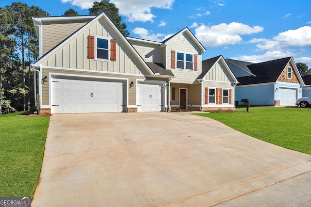 417 Lakeview Pl, Macon, GA 31211 - craftsman inspired home featuring board and batten siding, a front yard, driveway, and an attached garage