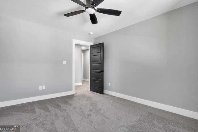 417 Lakeview Pl, Macon, GA 31211 - empty room with ceiling fan, carpet floors, and baseboards