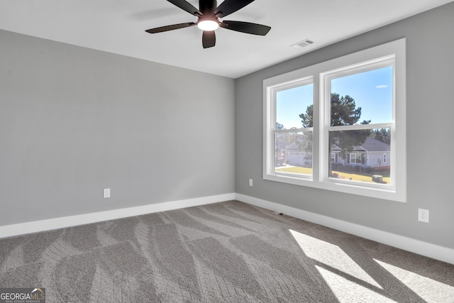 417 Lakeview Pl, Macon, GA 31211 - carpeted empty room with baseboards and a ceiling fan