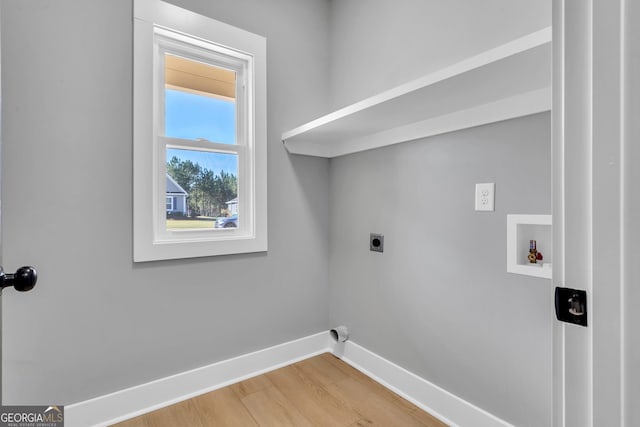 417 Lakeview Pl, Macon, GA 31211 - laundry area with electric dryer hookup, baseboards, light wood-type flooring, and washer hookup