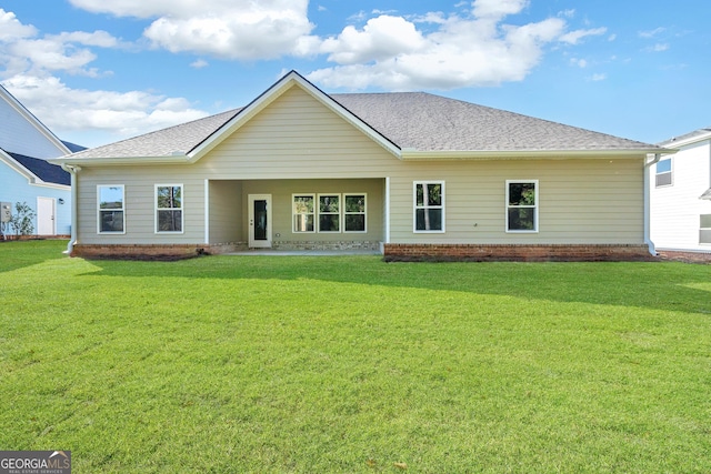 417 Lakeview Pl, Macon, GA 31211 - rear view of property with a lawn and roof with shingles