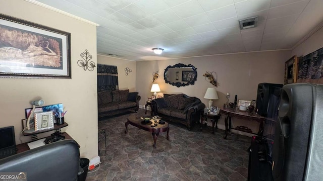 541 Lynmore Cir, Macon, GA 31206 - living area with dark stone finish flooring, ornamental molding, and baseboards