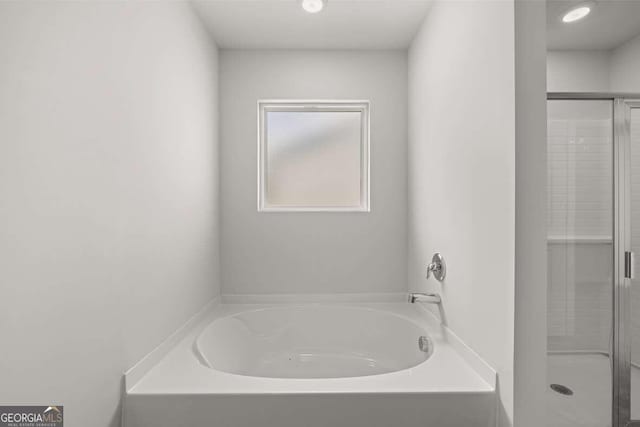 bathroom with independent shower and bath