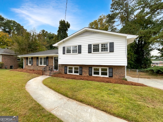 tri-level home featuring a front yard