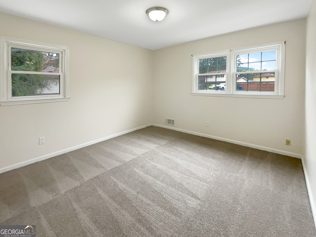 view of carpeted spare room