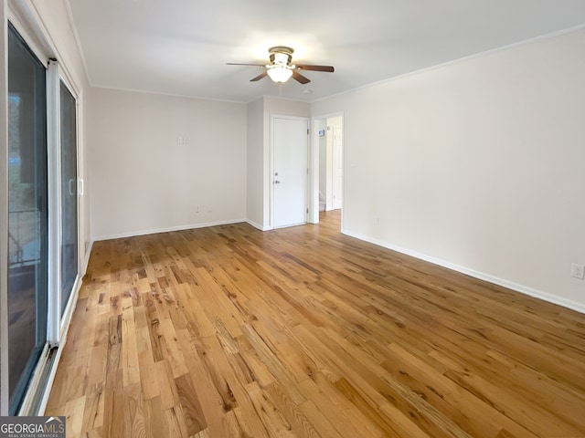 unfurnished room featuring light hardwood / wood-style floors, crown molding, and ceiling fan