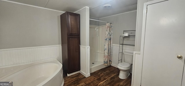 bathroom featuring crown molding, hardwood / wood-style flooring, toilet, and separate shower and tub