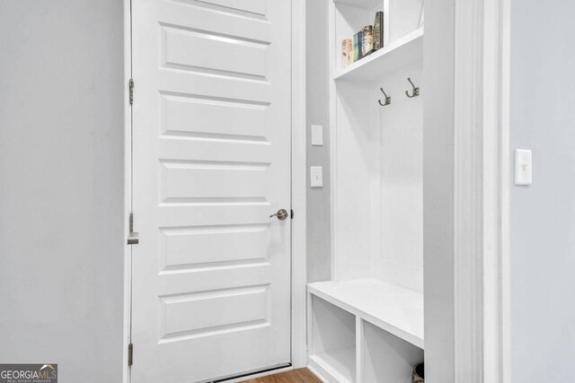 mudroom with hardwood / wood-style floors