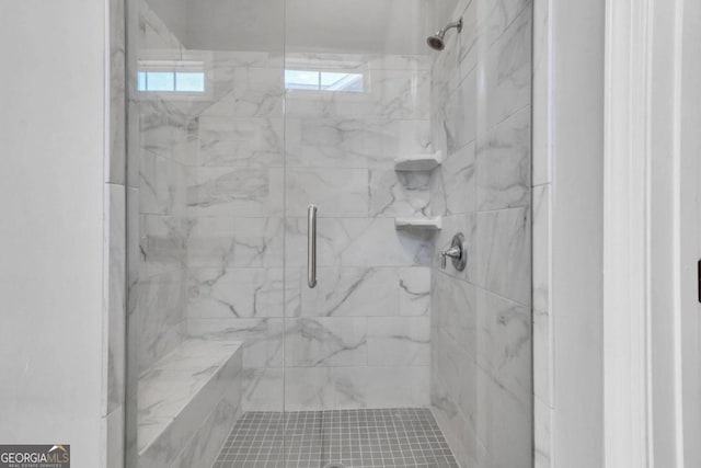 bathroom with an enclosed shower