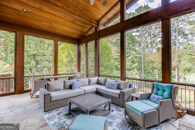 sunroom with wood ceiling and lofted ceiling with beams